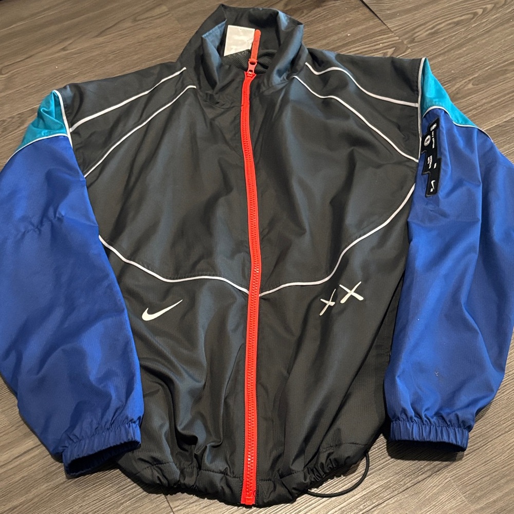 Nike Men's Black Windbreaker with Blue Sleeves